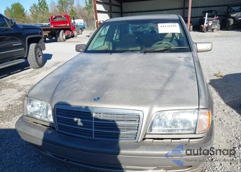 1999 Mercedes-Benz C 230 Kompressor из США, поврежденный, VIN WDBHA24G2XA686676